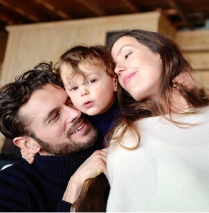 Stephanie Ann Canto with her husband and their baby. 